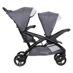 Baby Trend Sit N' Stand Double Stroller 2.0 DLX With 5 Point Safety Harness, Canopy, Extra Basket, 2 Cup Holders & Covered Compartment, Magnolia