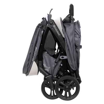 Baby Trend Sit N' Stand Double Stroller 2.0 DLX With 5 Point Safety Harness, Canopy, Extra Basket, 2 Cup Holders & Covered Compartment, Magnolia 5 Baby Trend Sit N' Stand Double Stroller 2.0 DLX With 5 Point Safety Harness, Canopy, Extra Basket, 2 Cup Holders & Covered Compartment, Magnolia - Image 3