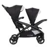 Baby Trend Sit N' Stand Double Stroller 2.0 DLX With 5 Point Safety Harness, Canopy, Extra Basket, 2 Cup Holders & Covered Compartment, Modern Khaki